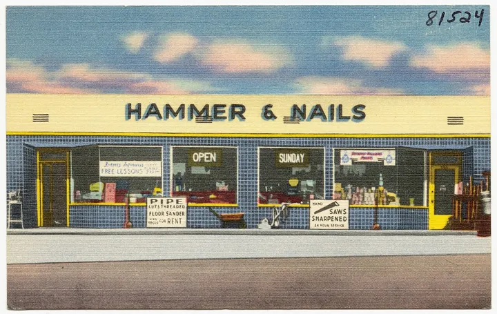 Photo d’origine : Une quincaillerie « Hammer and Nails » (carte postale ancienne)